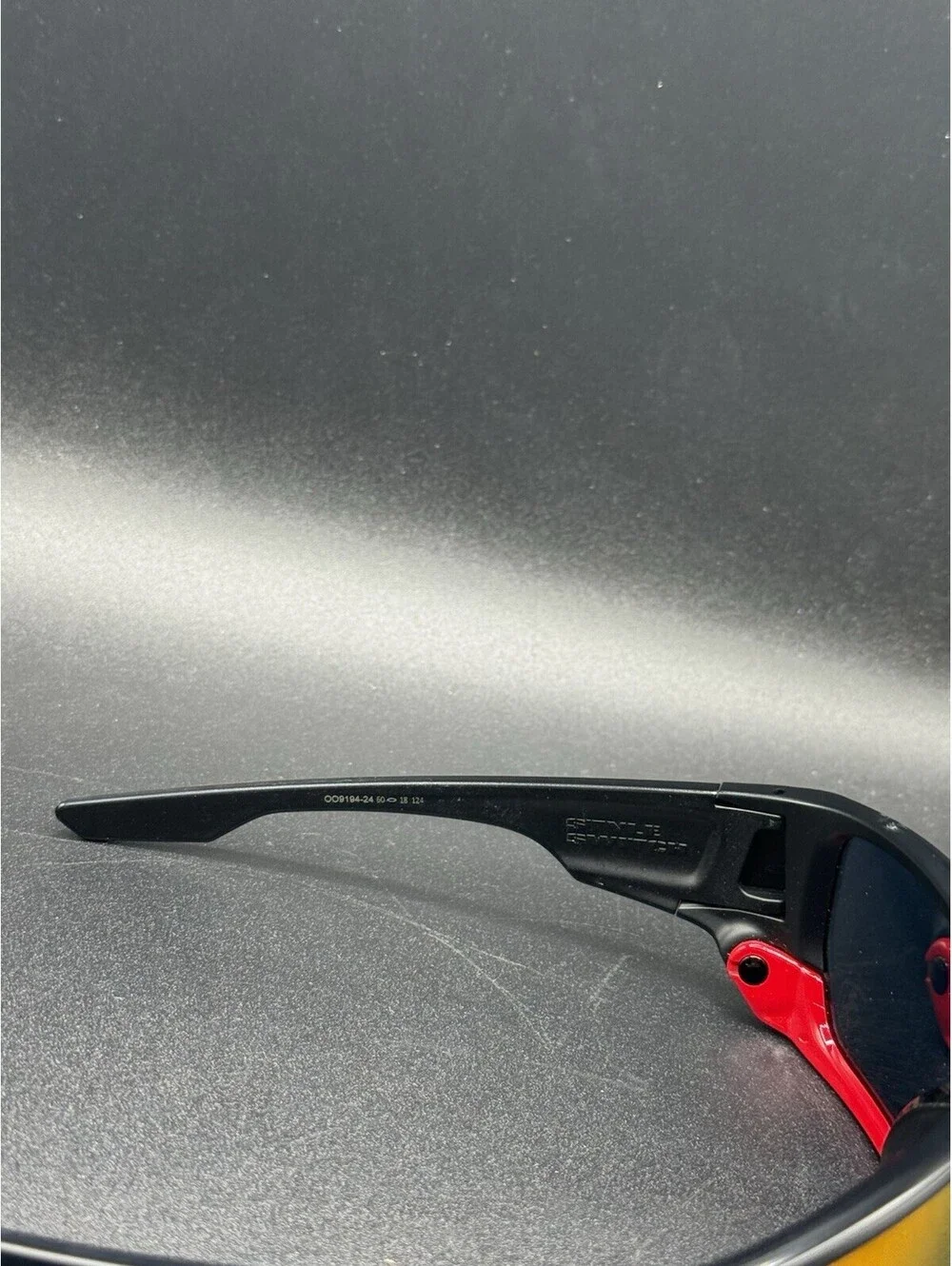 Oakley Style Switch Ferrari Matte Black/Ruby Iridium Lens OO9194-24